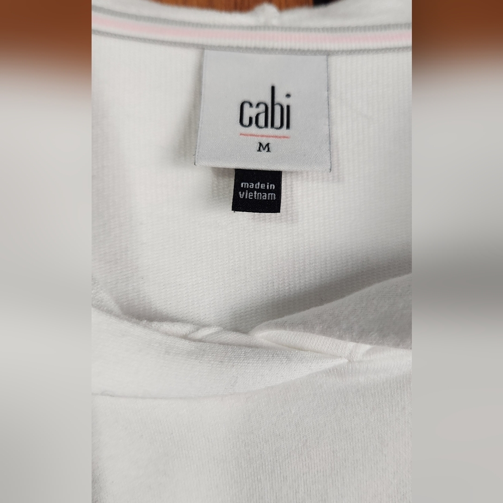 CAbi White Hooded ATC Pullover with Black Side Buttons Size Medium - NWOT - Picture 2 of 3